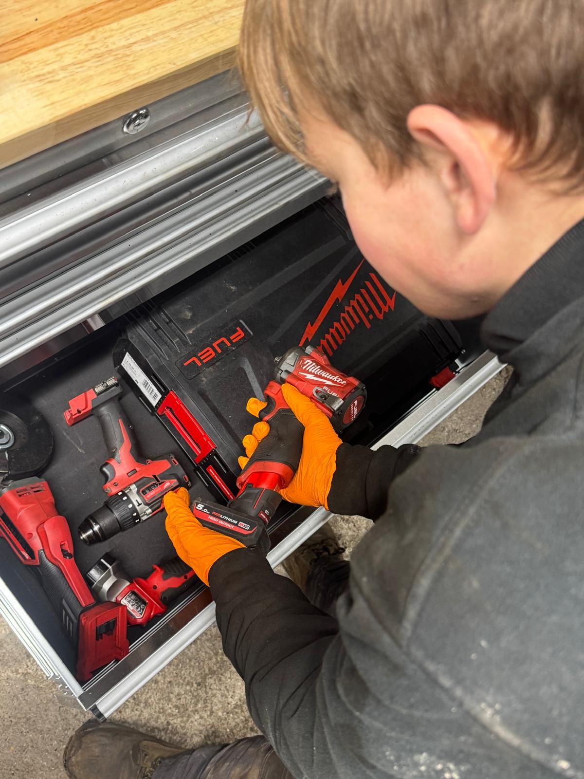 Drawer of Milwaukee cordless power tools in the Southern VSR workshop