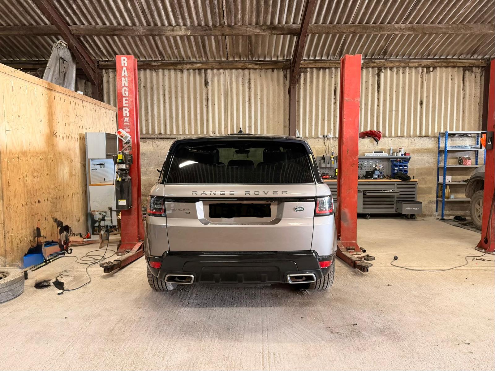 Range Rover Sport on the ramp inside the Southern VSR workshop